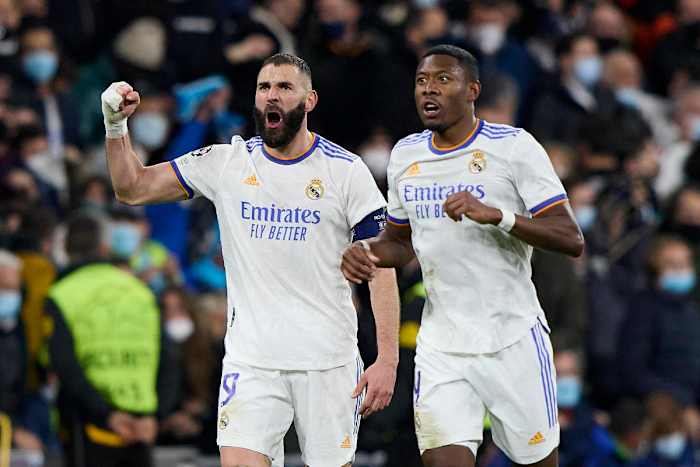 Karim Benzema celebrates with David Alaba during Real Madrid's 3-1 win over PSG